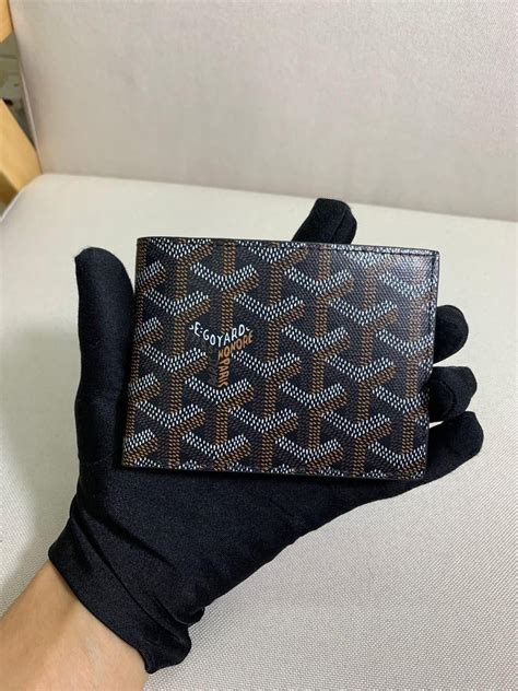 aadi goyard wallet